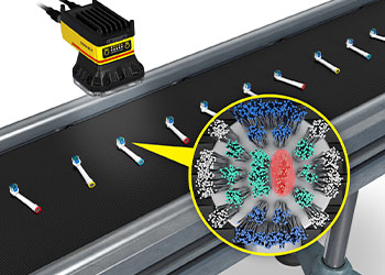 Têtes de brosse à dent électrique en train d ' être inspectées sur un convoyeur