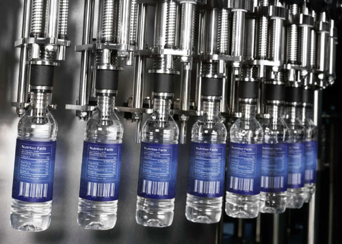 Liquid beverage bottle fill station production