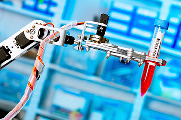 Life Science vial moved using vision guided robotics