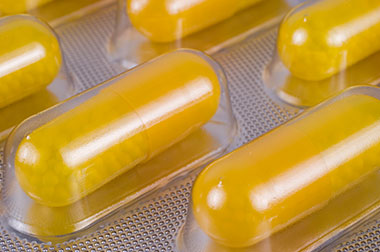 Yellow pharmaceutical medical pills in blister pack