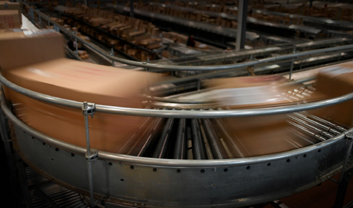 Boxes on a high-speed conveyer