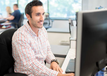 office worker watching online webinar